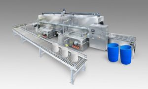 Return conveyor washer for cleaning buckets, pails, and drums in cosmetic factory